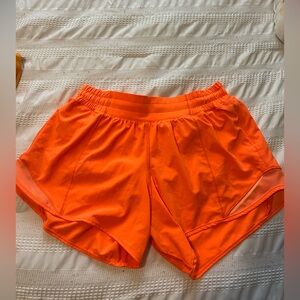 Highlighter orange shorts 4” inseam